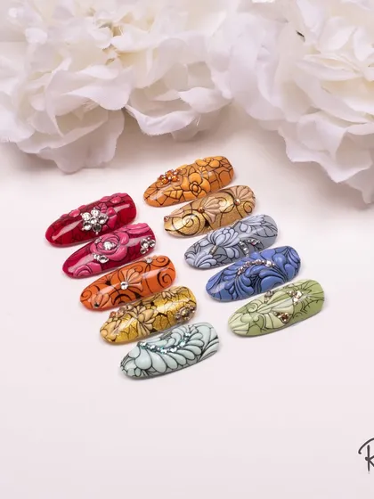 A set of my intricate floral designs with crystal accents.