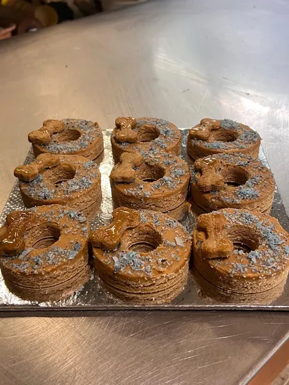 A fresh batch of dognuts ready for a weekend treat. I offer both vegetarian and non-vegetarian options to suit every dog's preference.