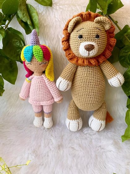 This large lion in a soft beige color is so huggable. His gentle expression and soft mane make him a comforting friend for children.