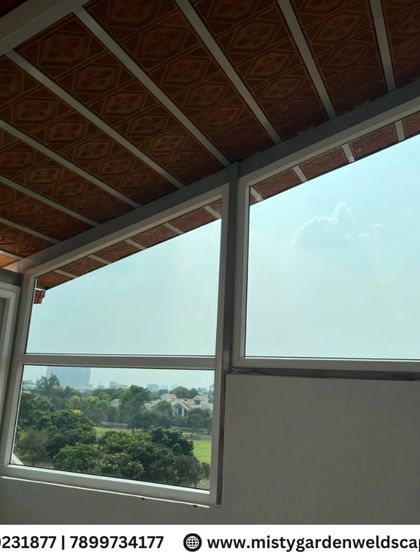 This image shows the combination of a traditional patterned tile roof with modern, large-pane UPVC windows, creating a unique aesthetic that is both classic and contemporary.