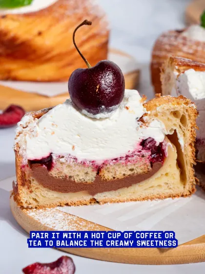 A perfect slice of the Cherry Trifle, ready to be served. It's an elegant dessert option for any high-end cafe.