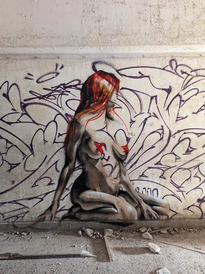 Views. A jam session in an abandoned building. I painted this figure amidst the chaos of everyone else's tags and pieces. It's about finding a moment of peace in the madness.
