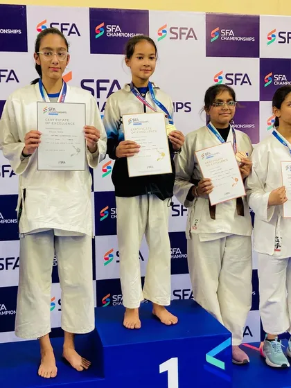 Bhavnika Negi on the top of the podium. She fought in an overweight category and still came out as the champion, showing true fighter spirit.