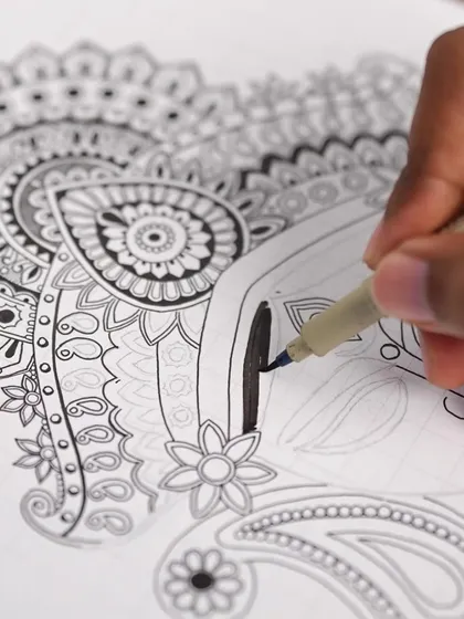 A process shot showing the detailed inking of the Durga Maa crown. Every pattern is carefully drawn to contribute to the overall divine and powerful feel of the artwork.