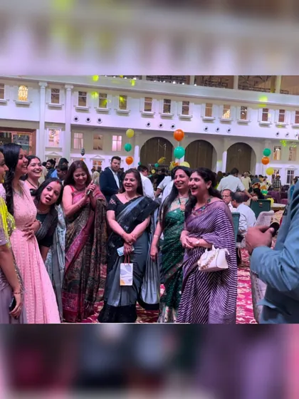 A group of ladies enjoying an interactive magic moment. Roving magic is a great way to break the ice and entertain guests as they mingle.