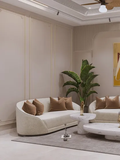 A living area featuring gracefully curved sofas and layered marble coffee tables. The render captures a soft, sophisticated aesthetic with a neutral color palette.