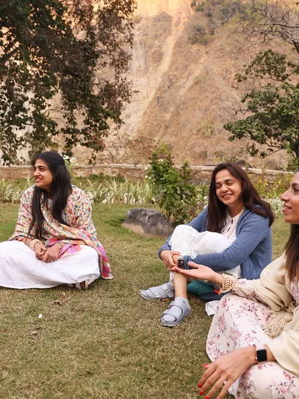 A sharing circle on the lawn. I create spaces where everyone feels comfortable opening up, sharing their journey, and listening with an open heart.