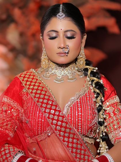 The full bridal look, showcasing the intricate details of the outfit, jewellery, and makeup.
