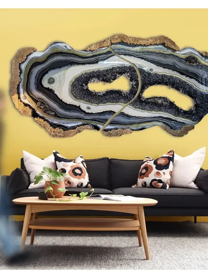 My 'Starry Night' geode artwork finding its home. I love how the black, white, and gold layers with real crystals bring a touch of cosmic energy and luxury to a living room.
