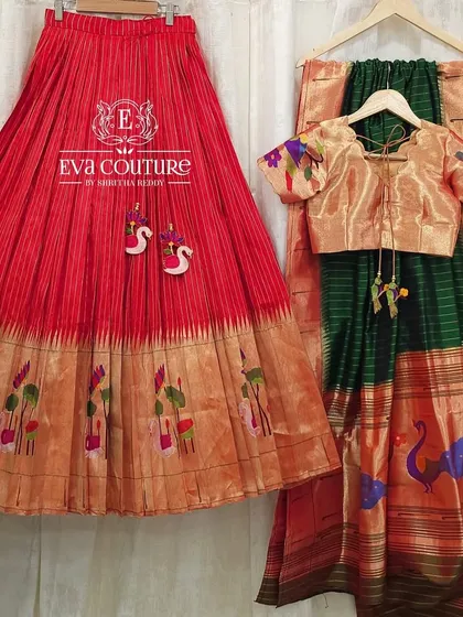 This is a complete pure Paithani silk lehenga set for women. It includes a pleated red skirt with a traditional Paithani border, a golden blouse with woven parrot motifs on the sleeves, and a matching green Paithani dupatta.