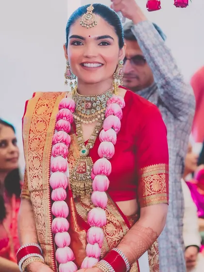 A joyful shot during the ceremony. The makeup is designed to be tear-proof and hug-proof, lasting through all the emotions of the day.
