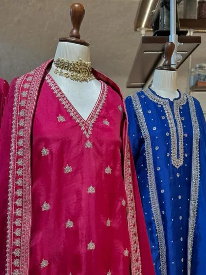 The combination of pink and blue offers a vibrant and celebratory feel, perfect for Karwachauth or Diwali festivities.