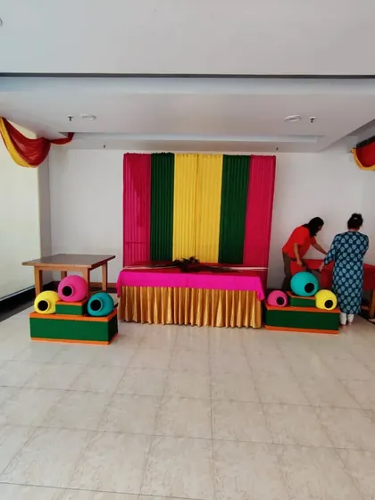 The full view of the Janamashtmi setup area, showing how the different elements come together to transform a simple room into a space for celebration.
