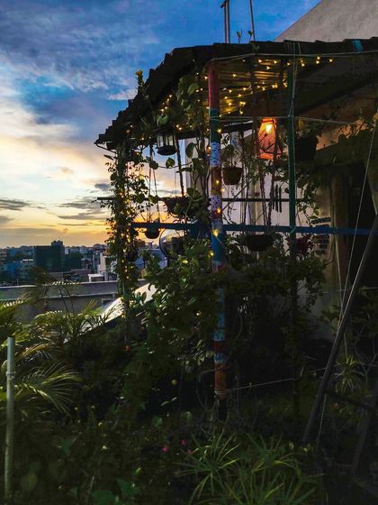 Sometimes, all you need is to take a break and do nothing. The garden at dusk, with the city lights in the distance, is the perfect place for that.