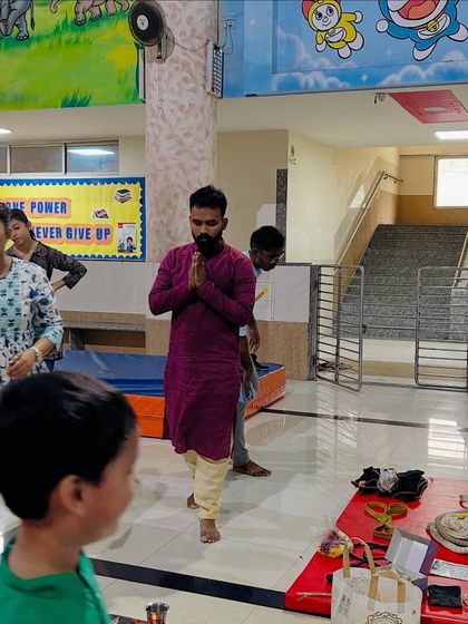 Celebrating Dussehra with a traditional puja of our equipment. I am seen here paying respect to the Mallakhamb pole, which is not just a tool but a symbol of our dedication to this art form.