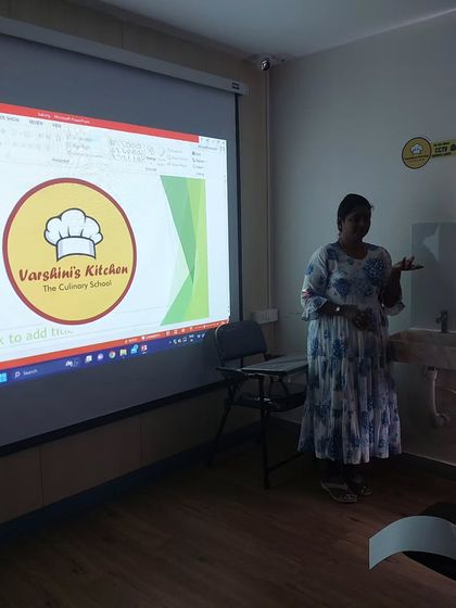 Another view of our theory classroom, where I am explaining concepts using a presentation. A good balance of theory and practical work is key to becoming a professional.