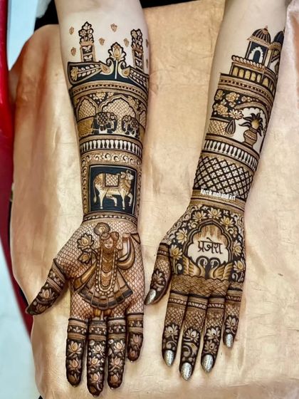 A divine bridal mehandi featuring a portrait of Shrinathji. The design also includes a holy cow, elephants, and the bride's name, creating a personalized and spiritual piece of art.