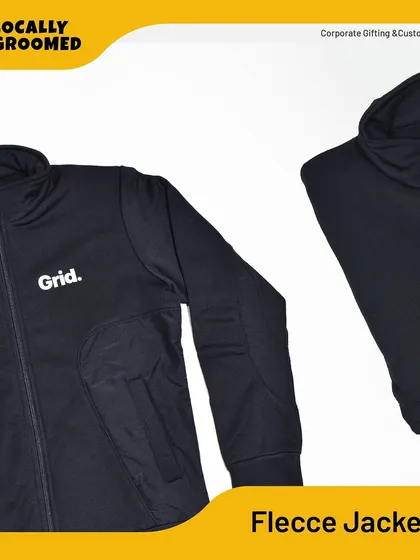 This black fleece jacket, branded for Grid, is perfect for keeping your team warm and stylish. The soft material and professional look make it a popular corporate gift.