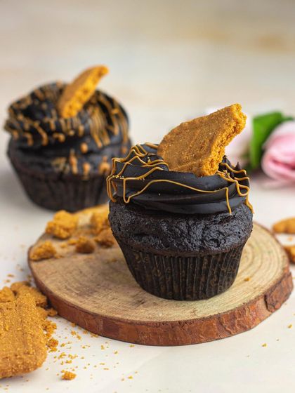 A closer look at my Biscoff cupcakes. I top a moist chocolate cupcake with a creamy frosting and a drizzle of Biscoff spread for an extra decadent treat.