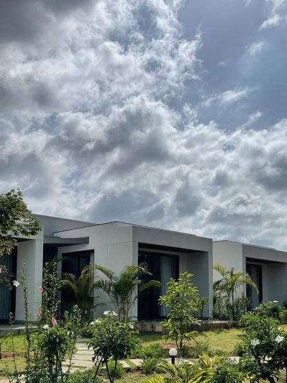 It’s a great feeling to see a project basking in the daylight. This view of "Nisarg" shows how the simple, modern forms interact with the natural landscape.