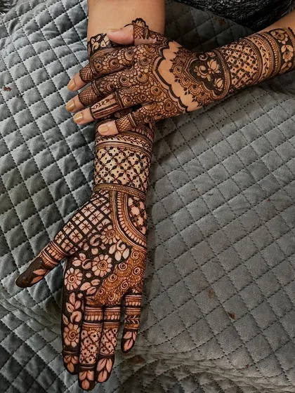 Another pose showcasing the beautiful engagement mehendi. The design is versatile and looks stunning from every angle.