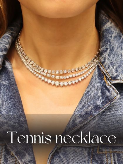 A classic tennis necklace is a must-have for the modern bride. This image shows three distinct styles layered together, from classic round diamonds to modern square settings.