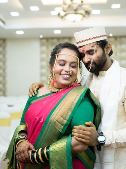 An intimate embrace in an empty hall, creating a feeling that they are the only two people in the world.