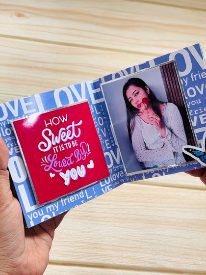 An open page from the keepsake mini album, with a photo on one side and a sweet message on the other.