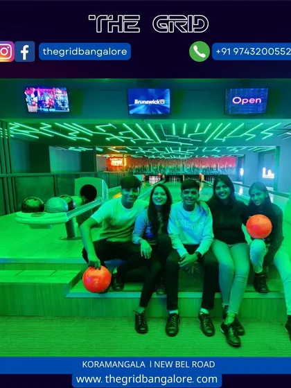 A group of friends sitting at our bowling alley.