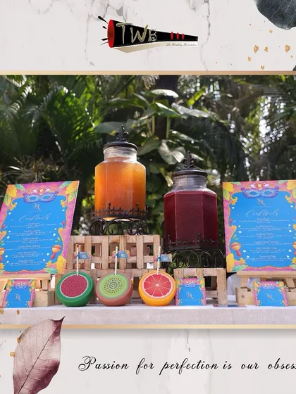 Another angle of our colorful mocktail bar, showcasing the custom menus and fresh juice dispensers.