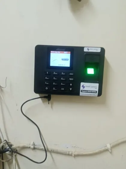 This image shows a biometric machine installed in a location with exposed wiring. We ensure that even in challenging environments, the system is set up to be functional and reliable.