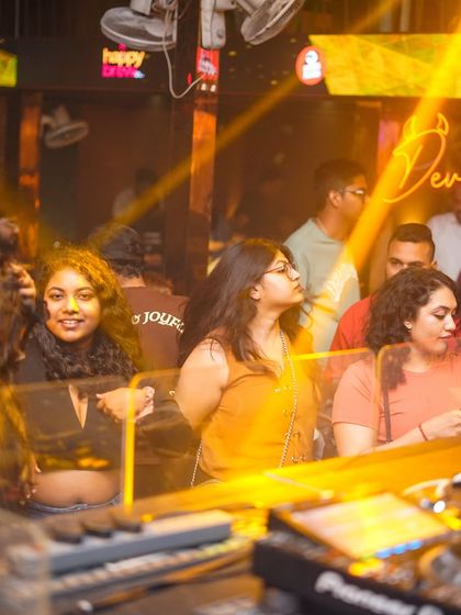 The view from behind the decks, looking out at the crowd.