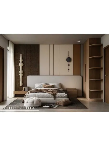 In this bedroom for a project in Uttar Pradesh, we created an asymmetrical, sculptural design. The off-center bed-back is balanced by a unique art piece and textured wall panels.