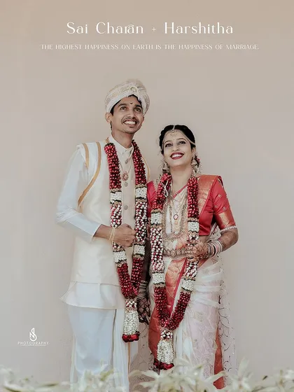 A classic wedding portrait of the happy couple, Sai and Harshitha, in their beautiful traditional attire.