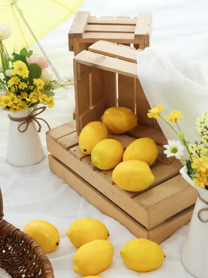 A closer look at our lemon garden. The little yellow umbrella adds a playful touch to this bright and happy setup. I love sourcing unique props to make each shoot special.