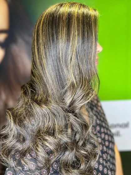 A side profile showcasing the brunette gold highlights, which add a perfect touch of sun-kissed color.