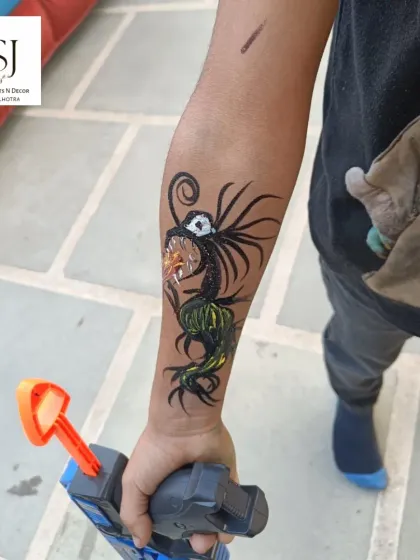 A cool and intricate temporary tattoo for a young guest. We work with talented artists who can create a wide variety of designs to delight partygoers.