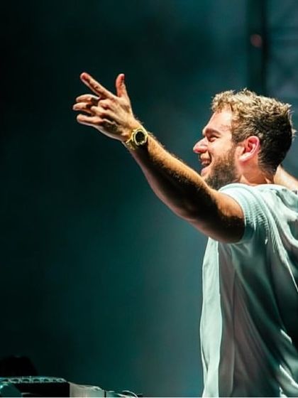 A candid shot of Zedd smiling and connecting with the Bengaluru crowd. It's these moments of genuine joy that make my events so special.