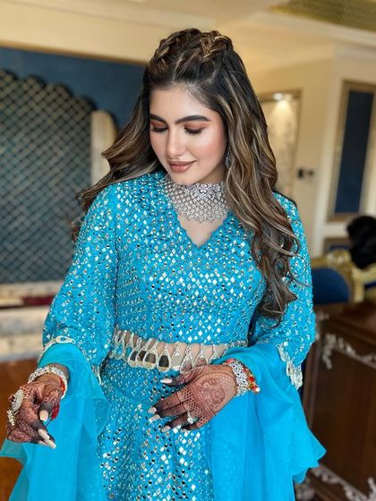 A lovely shot of the braided half-up style.