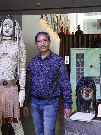 Another photo from my exhibition at Nexus Shantiniketan Mall. The 'Avatara' mannequin, made from keyboard keys, stands next to other works, including a piece inspired by the swastika symbol.