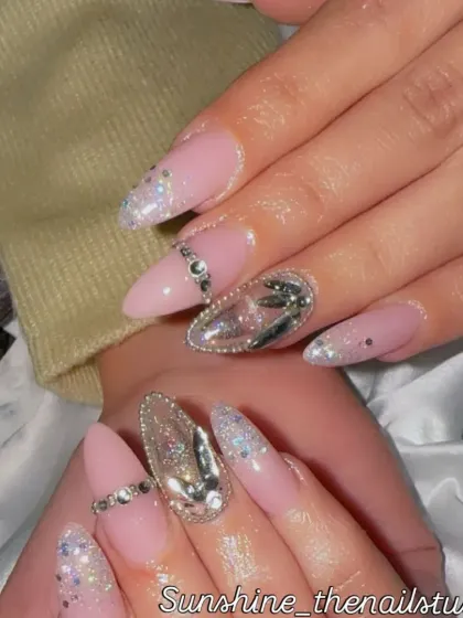 A glamorous set with pink, glitter, and heavy silver chrome and rhinestone accents.
