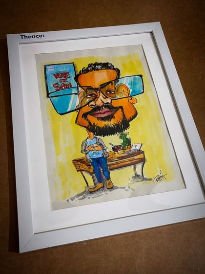 A framed caricature ready to be gifted at a corporate event. These make for fantastic and memorable presents for employees or clients.