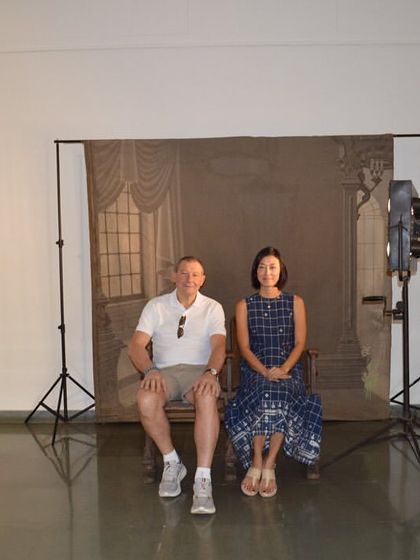 The Consul General of France for Bengaluru, Mr. Marc LAMY, and Mrs. Eunyoung, posing for a photo in the interactive studio setup.