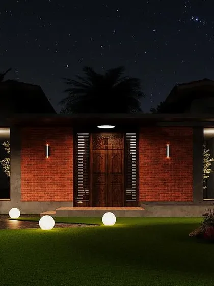 Lighting is key to a building's nighttime appeal. This farmhouse render demonstrates our ability to create dramatic and inviting exterior lighting schemes, using a combination of wall sconces and illuminated spheres to accentuate the entrance and landscape.