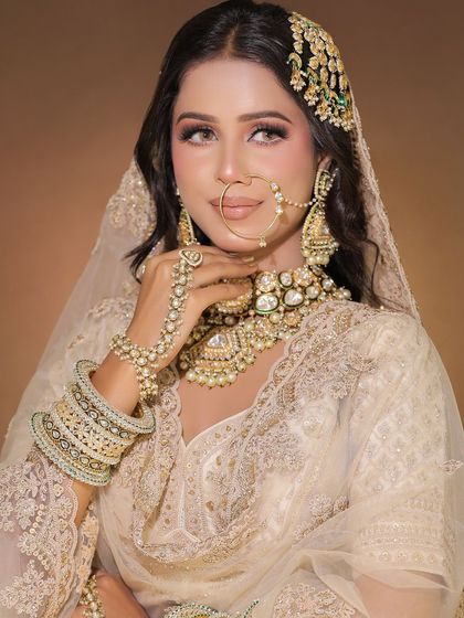 Three stunning shots of our pearl white chikankari lehenga. This is a perfect option for creators working on Nikah, day wedding, or minimalist luxury themes.