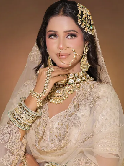 Three stunning shots of our pearl white chikankari lehenga. This is a perfect option for creators working on Nikah, day wedding, or minimalist luxury themes.