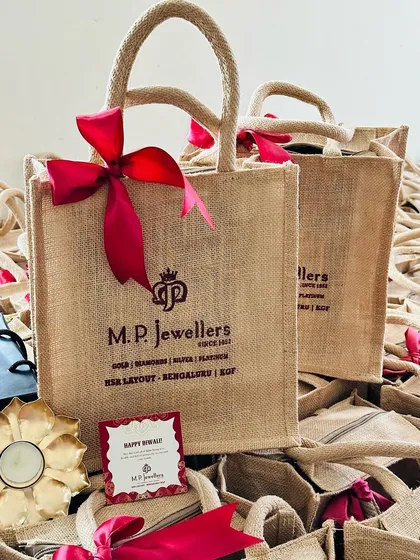 Make a sustainable and stylish statement with our custom-branded eco-friendly jute bags. These durable and reusable bags for M.P. Jewellers are perfect for event giveaways or as part of a larger gift hamper.