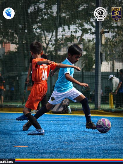 Action on the blue turf in Pune. Our players compete with intensity no matter the setting.