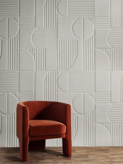 A testament to modern innovation, our Soft Surrounds 3D wallcovering creates a large-scale geometric feature that is both visually striking and acoustically functional. Paired with a bold, sculptural armchair, this setting highlights our ability to integrate cutting-edge materials with statement upholstery for a truly contemporary feel.