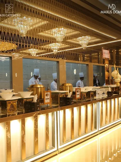 A glimpse of the grand scale I operate on at the Maxus Dome in Mira Bhayandar. This luxurious buffet setup, complete with elegant chandeliers and professional chefs, is designed to serve up to 2000 guests without compromising on quality or service.